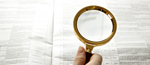 magnifying-glass-documents